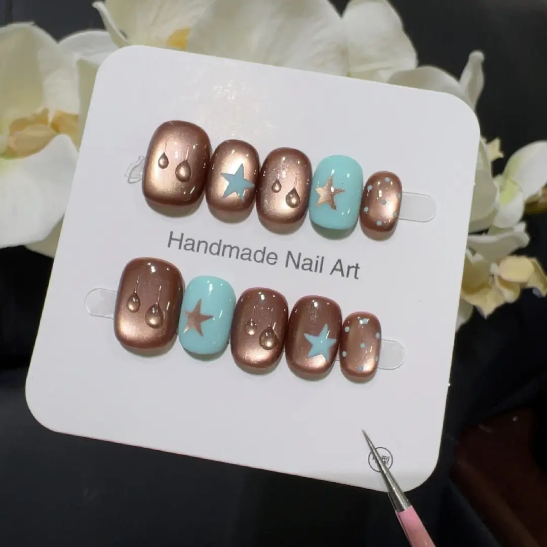 Nail Art Emerald - Petites gouttelettes d'eau marron haut de